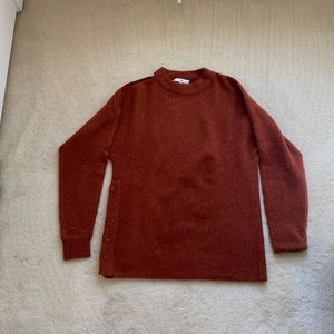 Tibi sweater with a cutoff shoulder